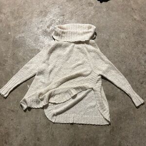 White cream turtleneck sweater.